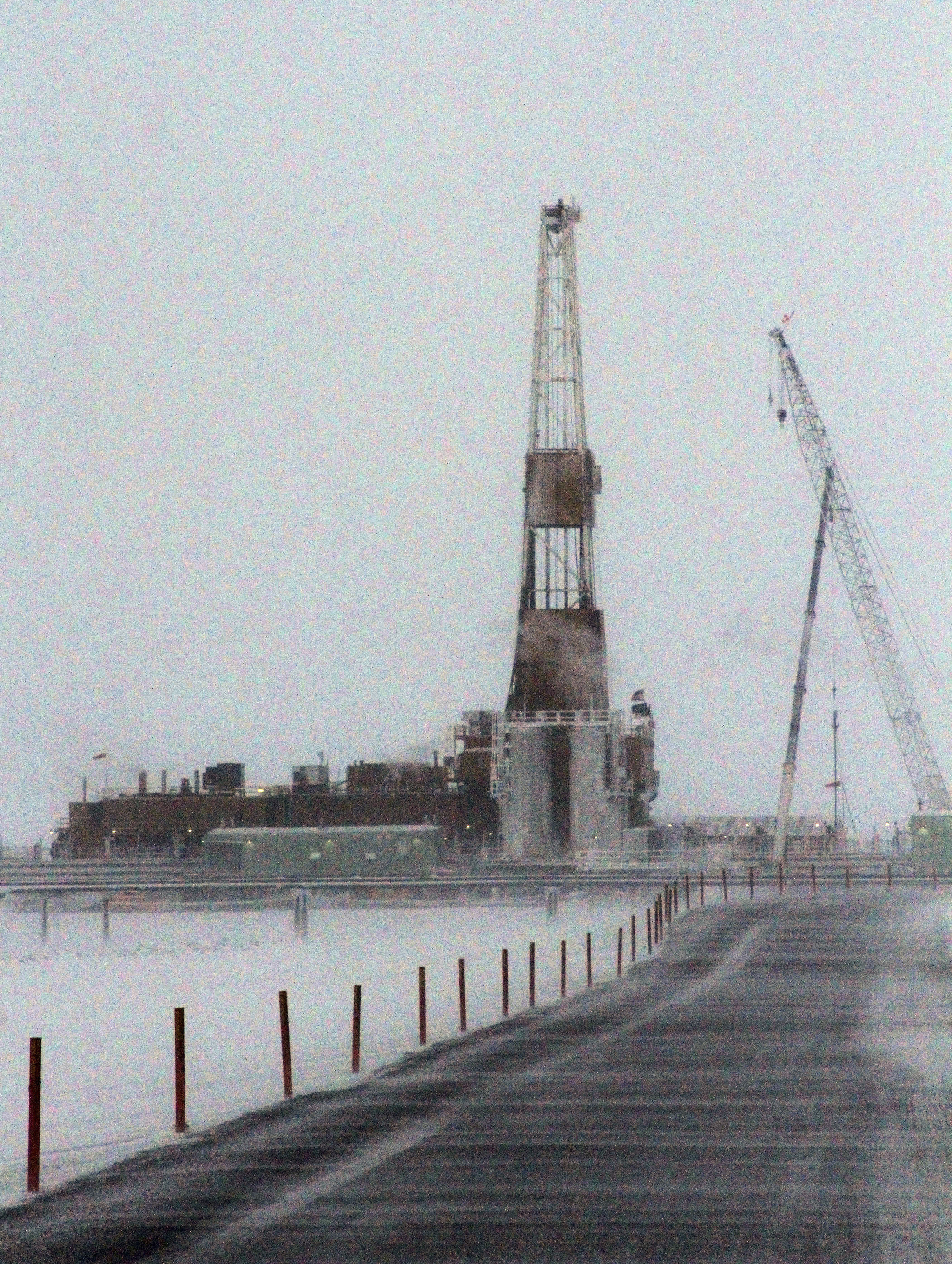 FILE 0 This Feb. 9, 2016, file photo, shows a million-pound drilling rig looming in the distance at the CD5 drilling site on Alaska’s North Slope in Nuiqsut, Alaska. Six of the country’s major energy-producing states have slipped into recession after a sharp decline in production and exploration over the last 18 months caused their tax revenue to plummet, according to a financial analysis released Tuesday, Jan. 24, 2017. (AP Photo/Mark Thiessen, File)