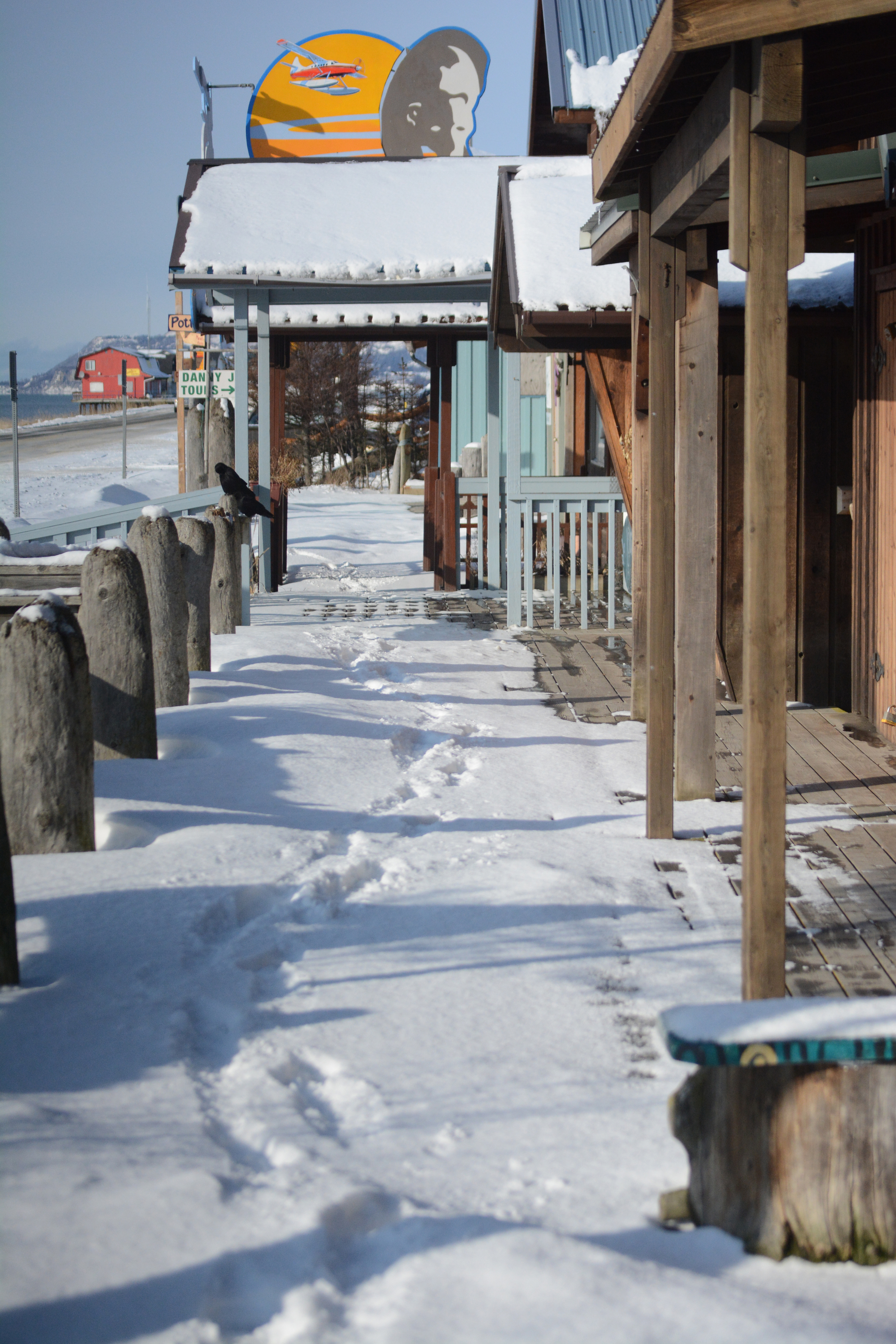 Still sleeping Snow covers the Coal Point boardwalk on the Homer Spit on Tuesday. Tourist shops have been boarded up since Labor Day, but the Spit will see some visitors next month on March 18 for the 24th annual Homer Winter King Salmon Tournament.