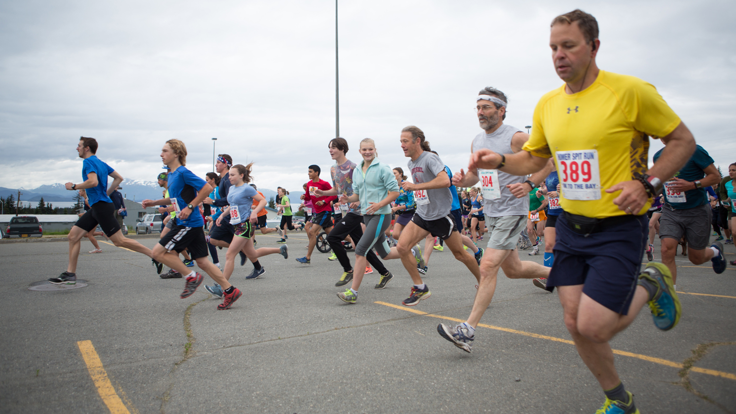 A crowd of nearly 300 runners starts the annual Spit Run at Homer High School on Saturday.-Photo by Aaron Carpenter, Homer News
