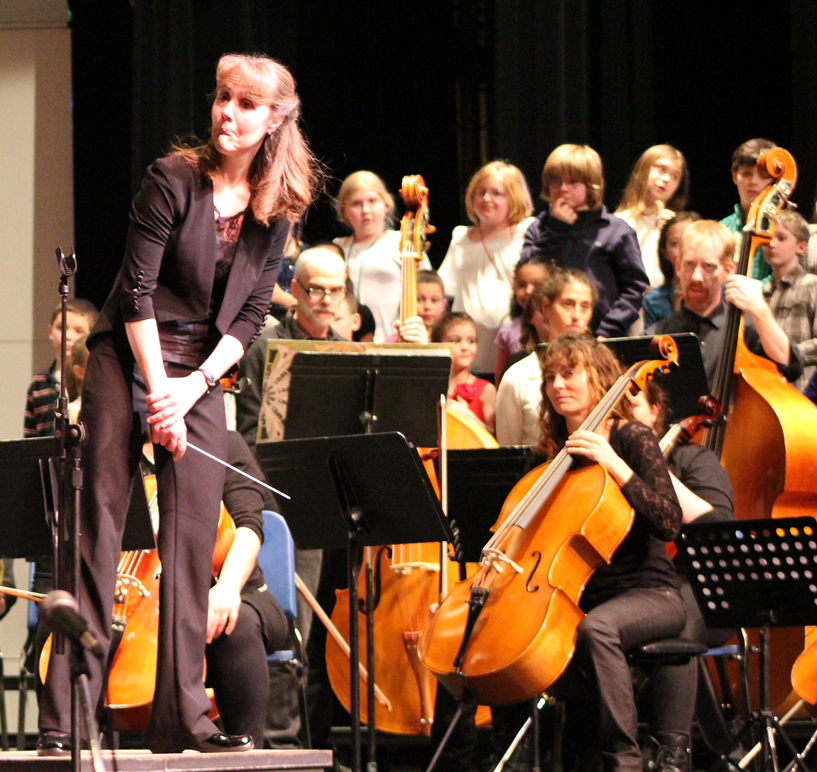 Kenai Peninsula Orchestra Conductor Tammy Vollum-Matturo makes a face during the Link Up concert in Homer on Jan. 15.-photo by Anna Frost