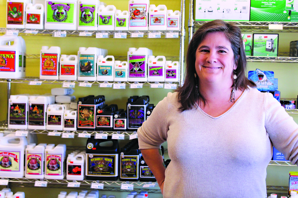 Homer resident and longtime indoor gardener Beth Carroll works in the new Panama Reds Indoor Gardening Store in Homer. Carroll’s wealth of growing knowledge is available to customers with questions about starting and maintaining their own gardens.-Photo by Anna Frost, Homer News