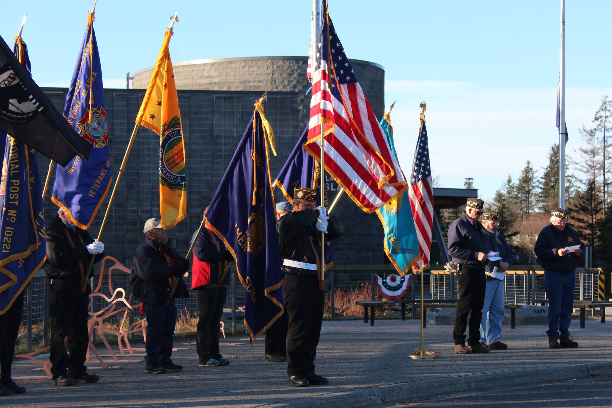 Veterans from several area outfits participate in a Veterans Day celebration Saturday, Nov. 11, 2017 in front of the Islands and Oceans Center in Homer, Alaska. (Photo by Megan Pacer/Homer News)