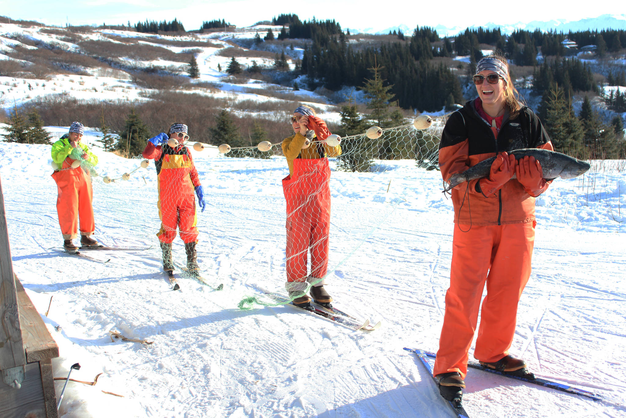 From front to back: Homer residents Reba Temple, Marin Lee, Morgan Edminster and Clarie Neaton prepare to ski the 2018 Homer Ski for Women in their attached ensemble costume Sunday, Feb. 4, 2018 at the Lookout Mountain Ski Trails. (Photo by Megan Pacer/Homer News)