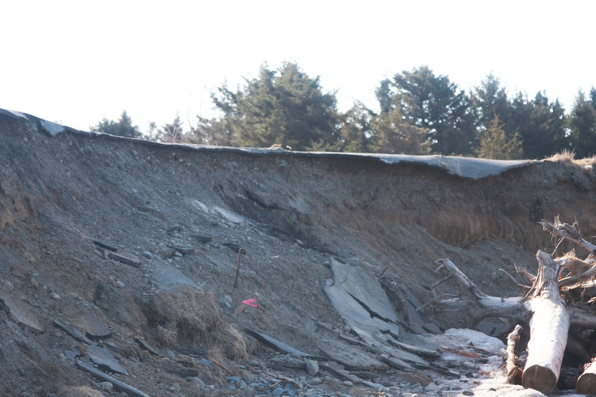 Three hundred lineal feet of the Anchor River State Recreation Area beach parking lot, shown here on Sunday, April 1, 2018 in Anchor Point, Alaska, suffered severe erosion damage caused by storms in September 2017. (Photo by Delcenia Cosman)