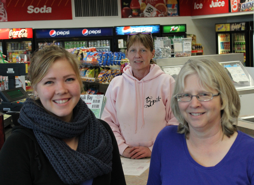 Jessie Erickson, Cory Plymire and owner Shelly Erickson offer welcoming smiles at Home Run Short Stop, formerly Baycrest Fuel and C Store. -Photo by McKibben Jackinsky, Homer News