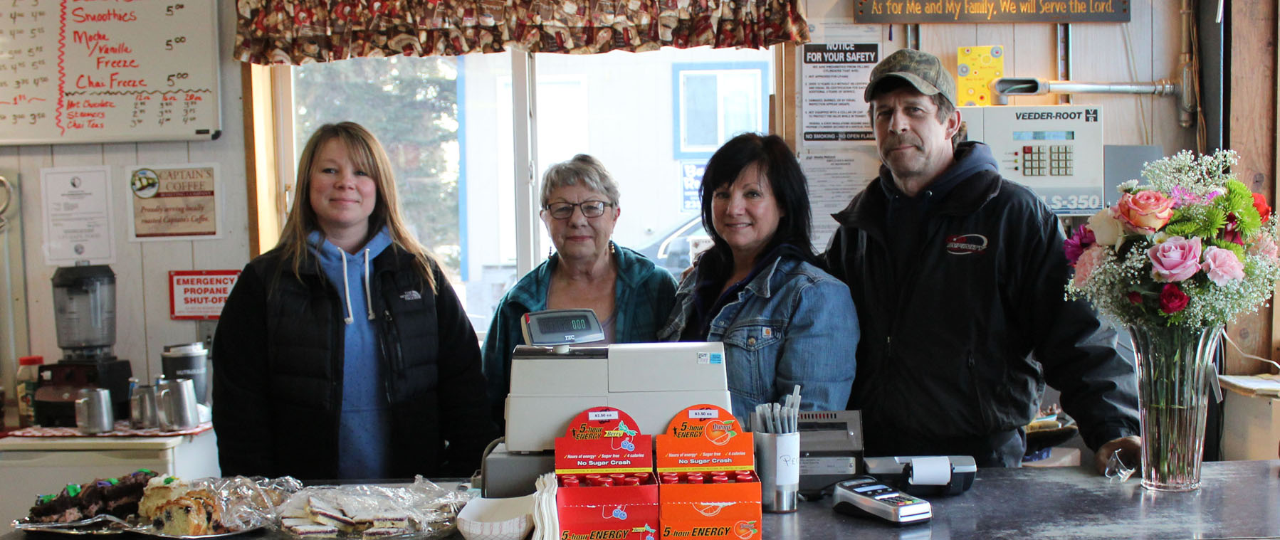 Members of the Thurmond family celebrate the grand opening of Thurmond’s Far West Auto on Monday. From left: Brandi Blauvelt, her grandmother and Thurmond’s original owner Vanita Thurmond, and new owners Elaine and Dale Griner.-Photo by McKibben Jackinsky, Homer News