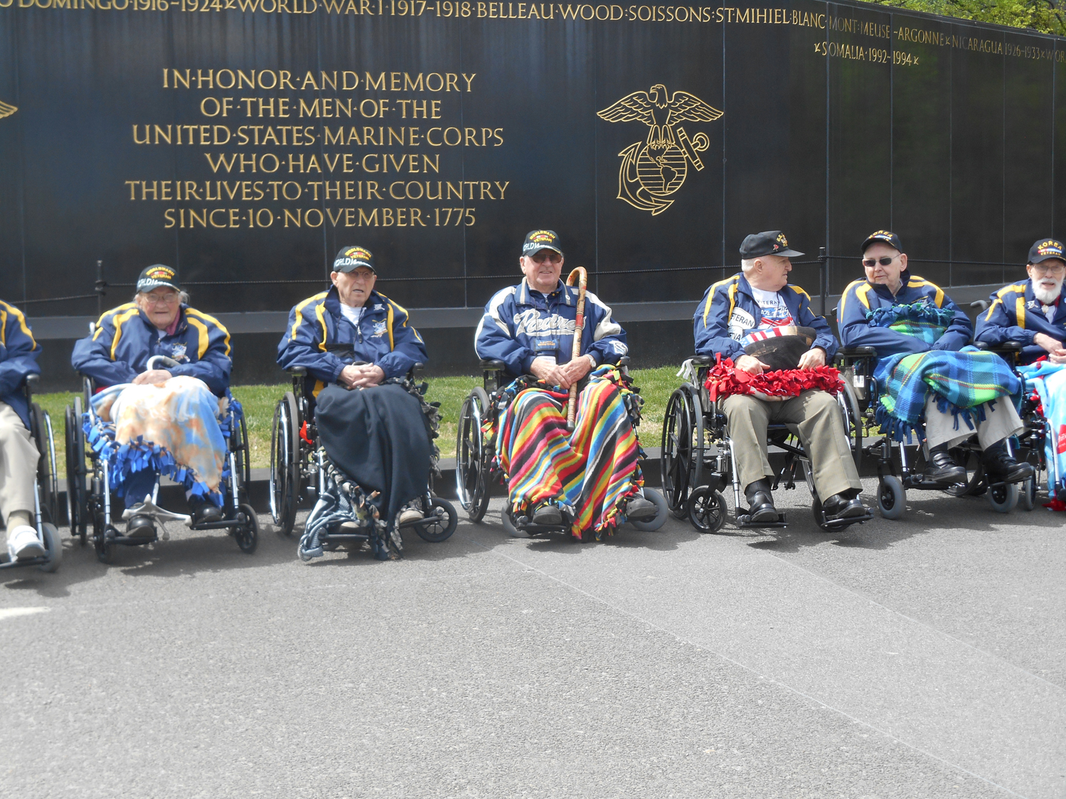 Veterans on the Last Frontier Honor Flight pose for a photo at the Iow Jima memorial.-Photo by Michael Armstrong, Homer News