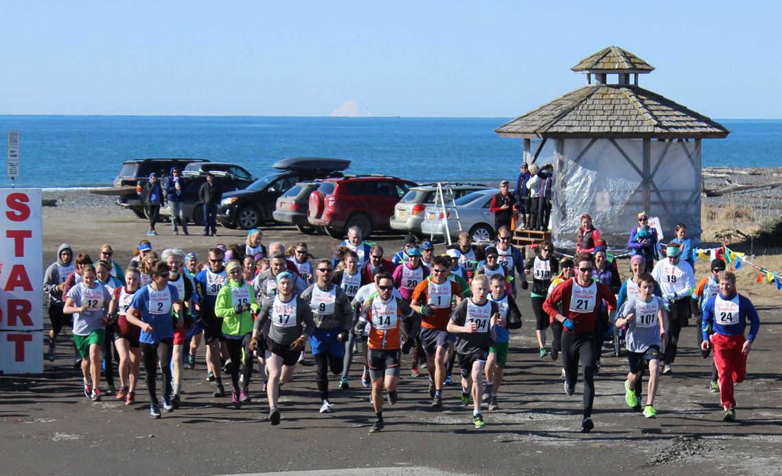 Runners begin the Sea to Ski race at Mariner park-Photo by McKibben Jackinsky, Homer News