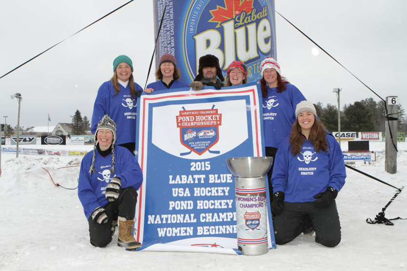 The Divas show off their National Pond Hockey Championship Trophy in the women’s beginner division. From left: Di Carbonell, Kristen Brown, Marianne Aplin, coach-manager Charlie Stewart, Karyn Noyes, Ingrid Harrald and Lindsay Layland.-Photo provided