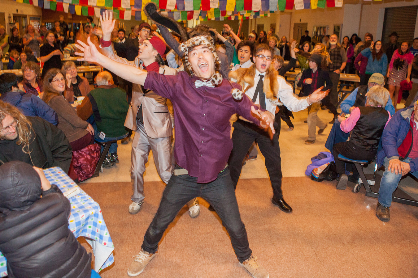 Ben Westphal, a senior at Homer High School, surprises the crowd at the Homer Outdoor Film Festival by leading the HoWL Skits ’n Scats crew in a flashmob dance number amid the audience. Westphal choreographed two dance numbers for HoWL’s event.-Photos by Don Pitcher