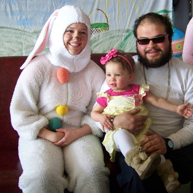 The Easter Bunny visits with Aisha Tapia and her dad, JR, at the Emblem Club’s Easter event in Homer.-Photo by McKibben Jackinsky, Homer News