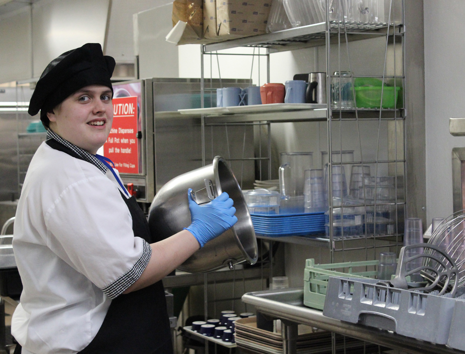 Kaylee Alward is busy at work in South Peninsula Hospital’s kitchen.-Photo by McKibben Jackinsky, Homer News