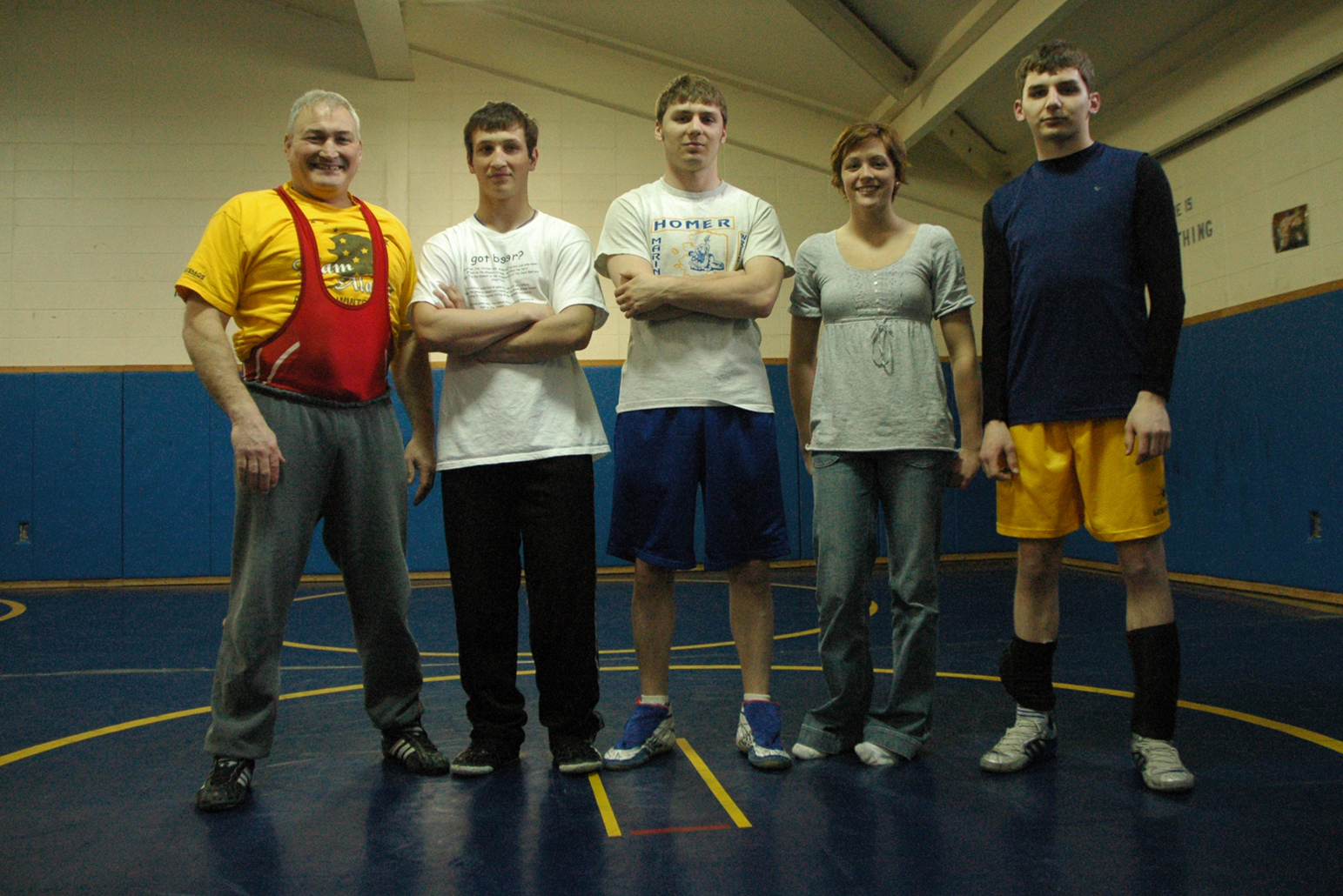 Homer area participants at the 2008 Arctic Winter Games in Yellowknife, Northwest Territories, Canada, brought home 12 medals. From left, Coach Steve Wolfe, Zenon Martushev, Tris Brymer, Brittney Wyatt and Robby Brymer.  