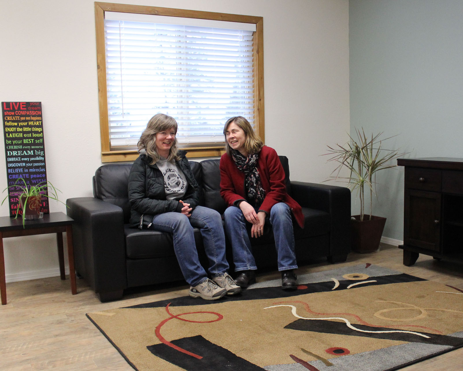 South Peninsula Behavioral Health Services’ Child and Family Services Director Margarete Wisner and Lisa Pitta, lead case manager, review renovations to the program’s new space on Lakeside Drive.-Photo by McKibben Jackinsky, Homer News