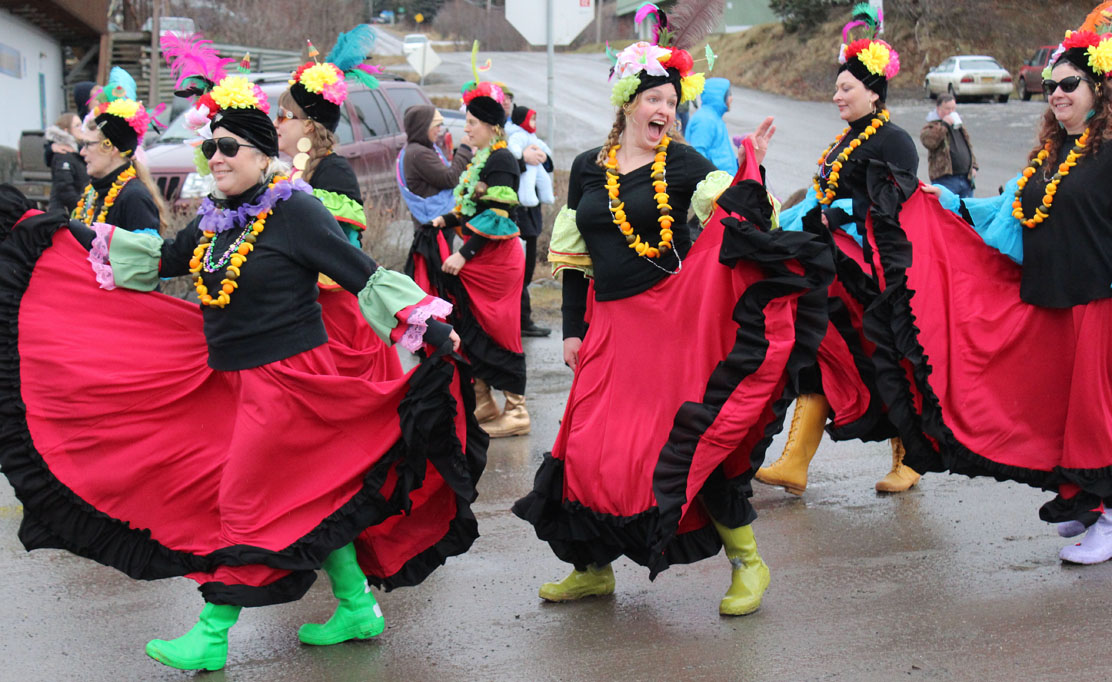 The Krewe of Gambrinus drill team performs at the judges’ stand during Saturday’s parade.-Photo by McKibben Jackinsky, Homer News