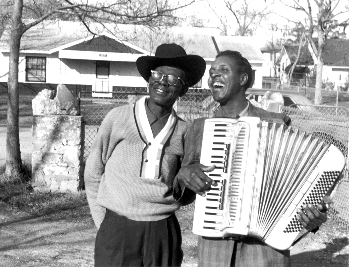 Two musicians play in a still from “This Ain’t No Mouse Music.”-Photo provided