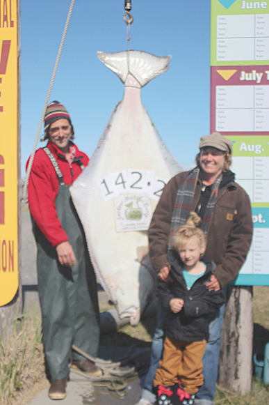 April Saputski of Rathdrum, Idaho, has taken the lead with a 142.2-pound halibut caught May 27.-Photo provided