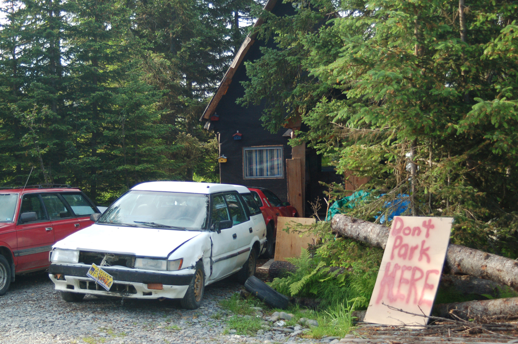 Demian Sagerser’s house off the Sterling Highway near Stariski Creek is where Demarqus Green shot and killed Sagerser on July 7, 2012. A game camera in the woods to the right in the photo caught Green entering and leaving the house.-Photo by Michael Armstrong, Homer News