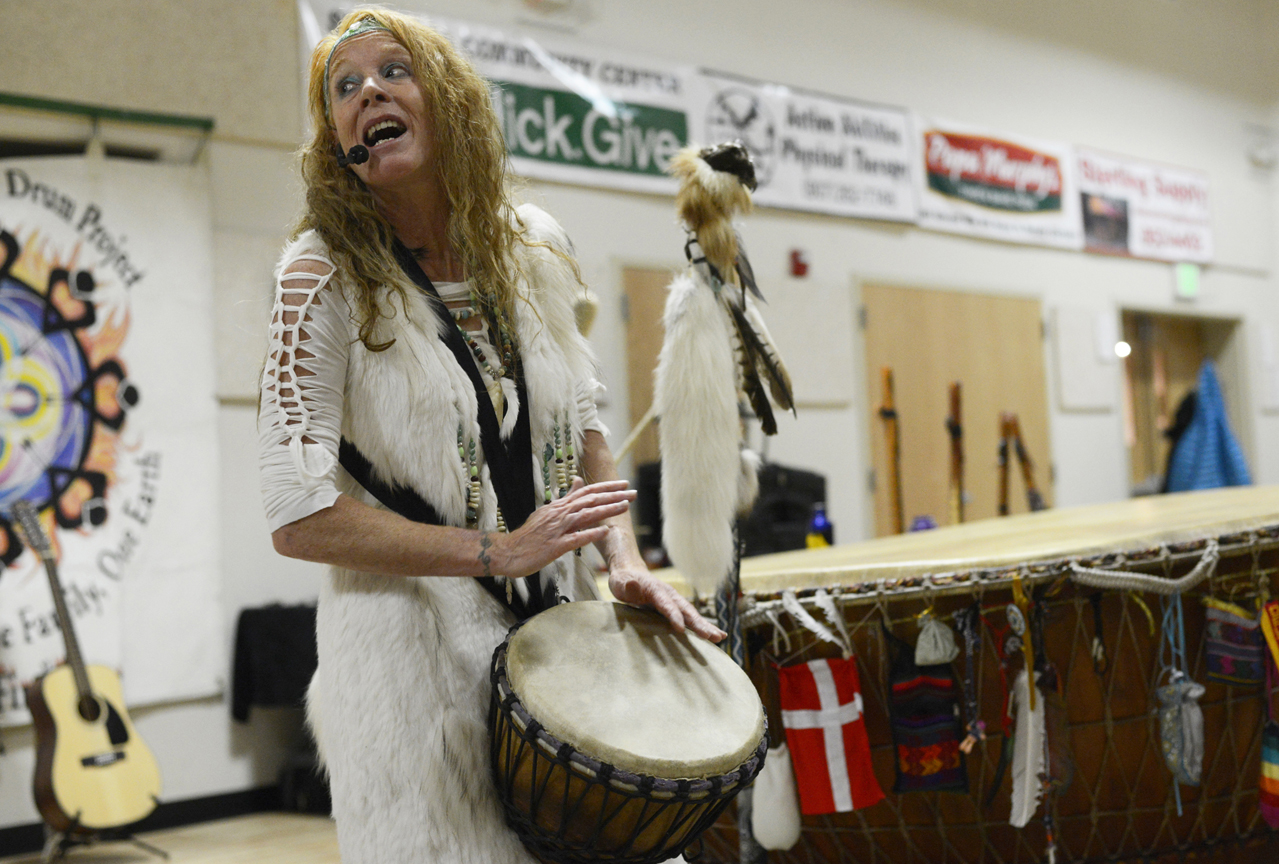 Suraj “White Eagle” Holzwarth performs a song from her latest CD,“Holy Ground” on Sunday, Dec. 20, 2015 at the Sterling Community Center in Sterling. Holzwarth and other performers are on a tour to promote the album, which was recorded to honor the foreign countries they visited over the last 20 years.