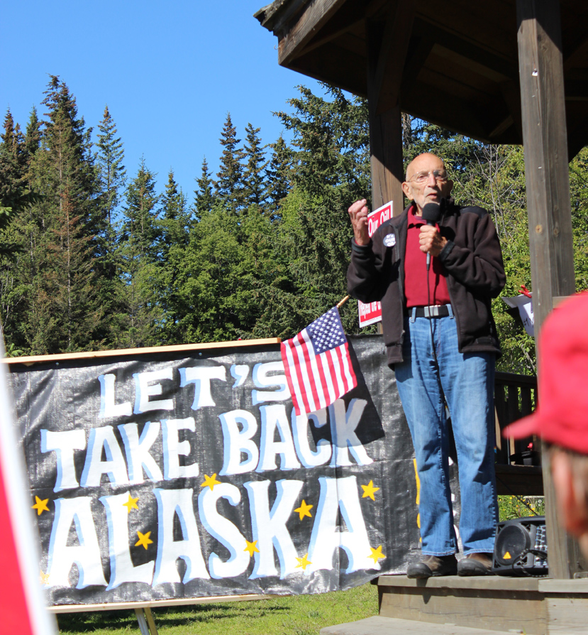 Vic Fischer of the Vote Yes! Repeal the Giveaway group speaks at Saturday’s rally in Homer.-Photo by McKibben Jackinsky, Homer News