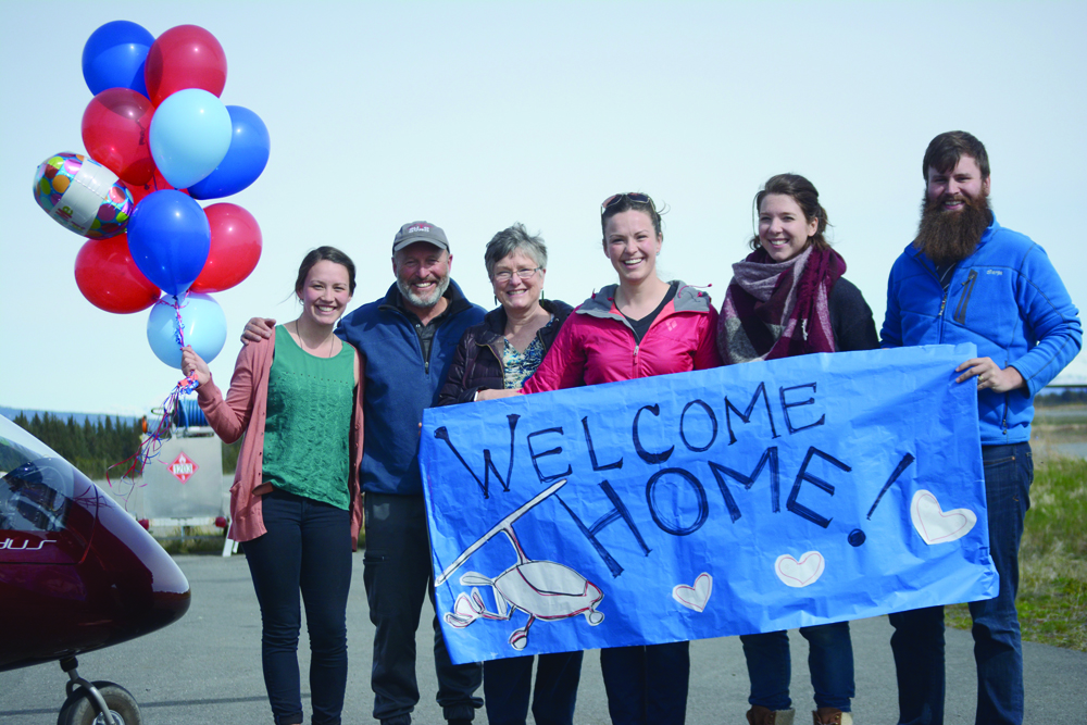 Ian Reed, second from left poses with his family after arriving in Homer on Friday afternoon in a Calidus gyrcopter aircraft, above, he flew from Seattle. From left to right are daughter Shannon Reed, Ian Reed, wife Linda Reed, daughter Anna Reed, daughter-in-law Abi Reed and son Lin Reed. The trip took 19 flying hours over five days, with mostly tail winds. It is the first Calidus to be flown to Alaska. Reed plans to offer gyrocopter instruction and be a sales agent for the German-made aircraft.