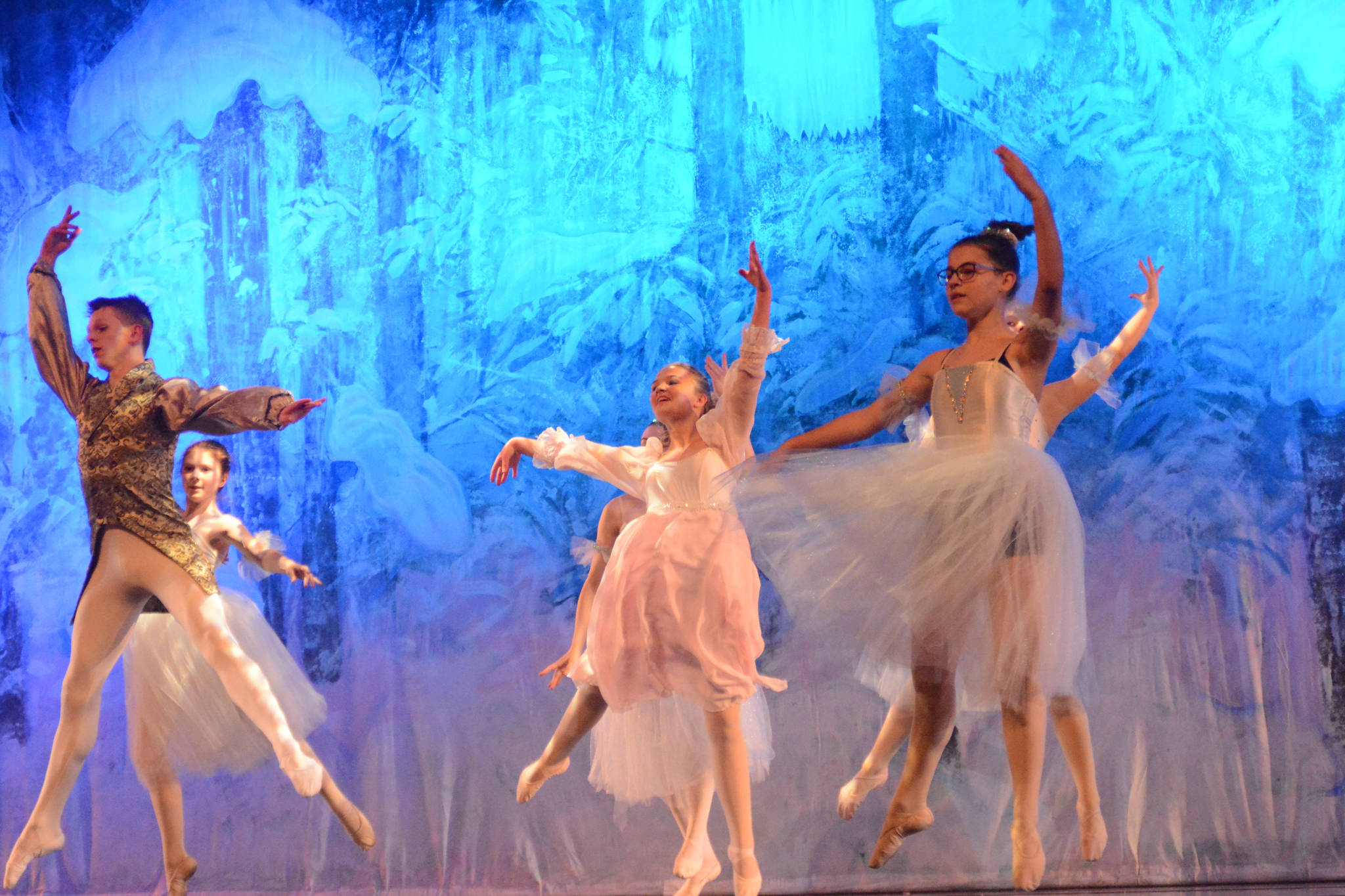 Collin Trummel, the Nutcracker Prince, far left, rehearses the snow fairies scene from the Homer production of the Nutcracker Ballet on Nov. 25, 2018, at the Mariner Theatre in Homer, Alaska. (Photo by Michael Armstrong/Homer News)