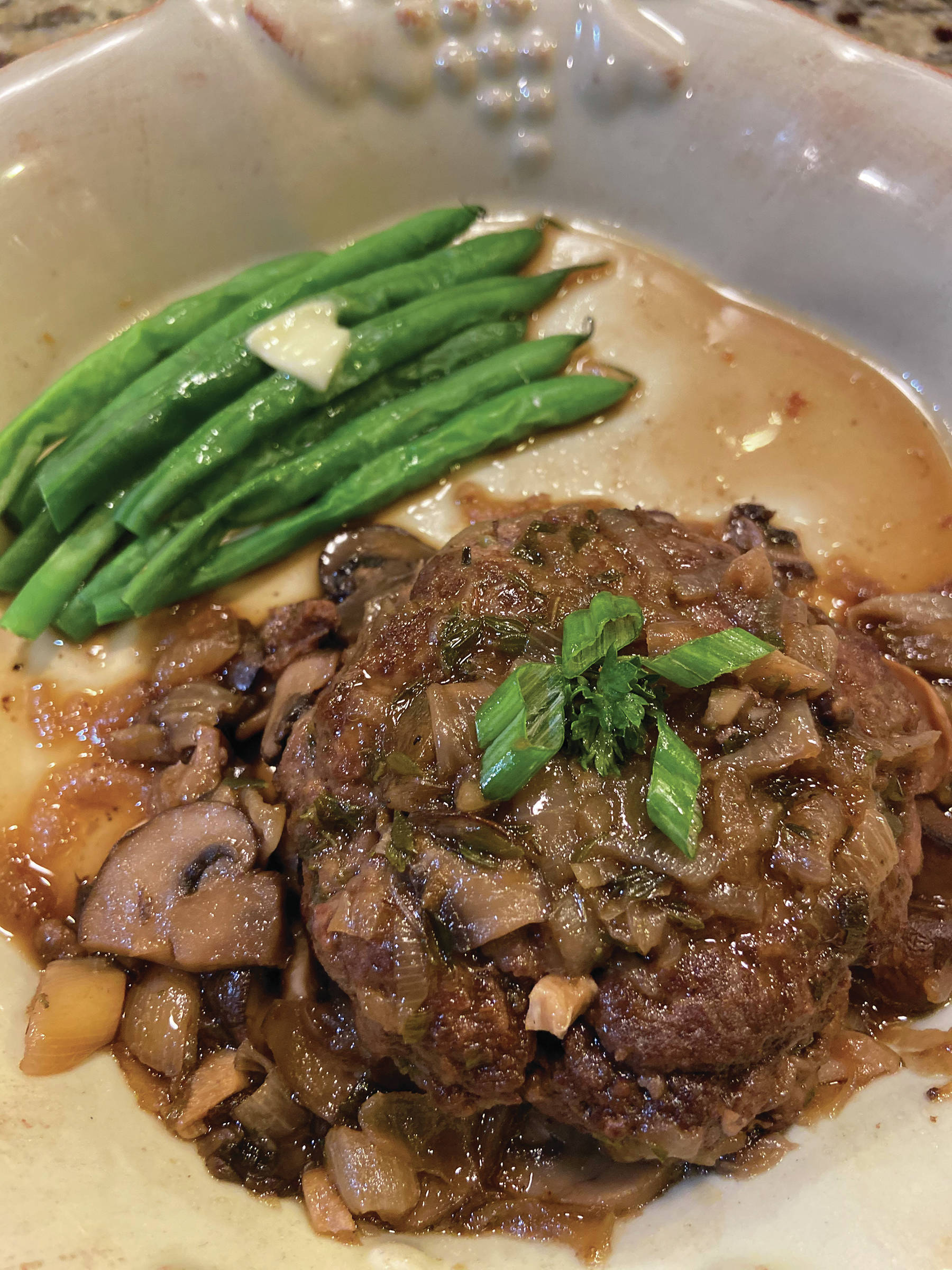 Teri Robl’s recipe for Salsbury Steak uses moose meat instead of the traditional beef, as seen here on Feb. 10, 2020, in her Homer, Alaska, kitchen. (Photo by Teri Robl)