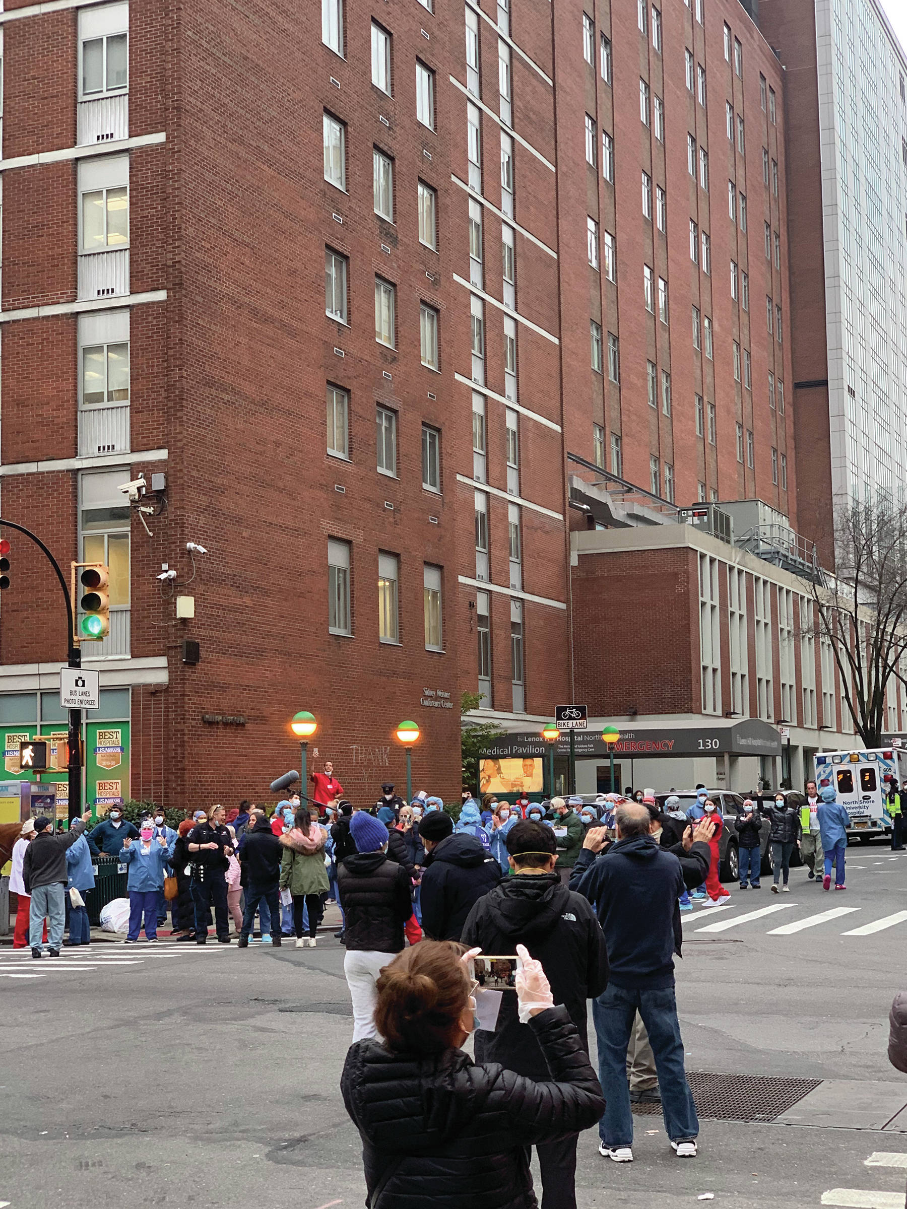 New Yorkers cheer for Lenox Hill Hospital health care workers at the 7 p.m. shift change earlier in April in Manhattan, New York. (Photo courtesy of Dharti Patel)