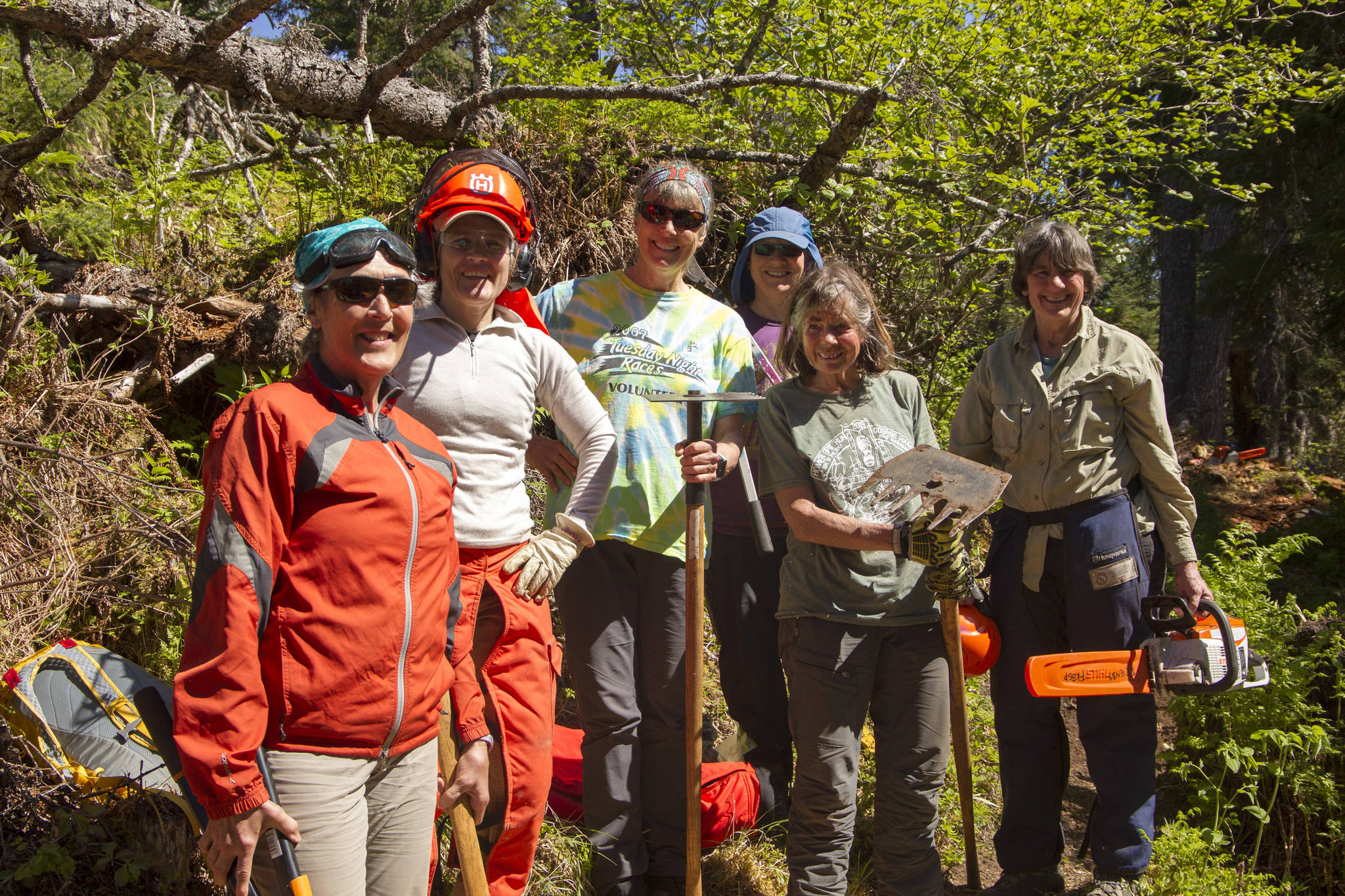 A group of six women tackled the work needing to be done during National Trails Day at South Eldred trail including cutting up fallen trees, re-establishing the trail tread, clearing overgrown plants and ensuring the trail markings were in sight and up-to-date. Pictured left to right are Kristine Moerlein, Amy Holman, Kathy Sarns, Lyn Maslow, Ruth Dickerson and Kris Holderied. (Photo by Sarah Knapp/Homer News)