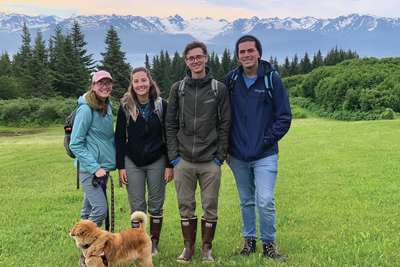 From left to right, Ashley Laukhuf, Kristin Armstrong, Nick Hansen and Kyle Barnes pose for a photo earlier this month on Inspiration Ridge Preserve near Homer, Alaska. The graduate students with the University of Michigan, Ann Arbor, were doing research with the School for Environment and Sustainability. (Photo by Nina Faust)