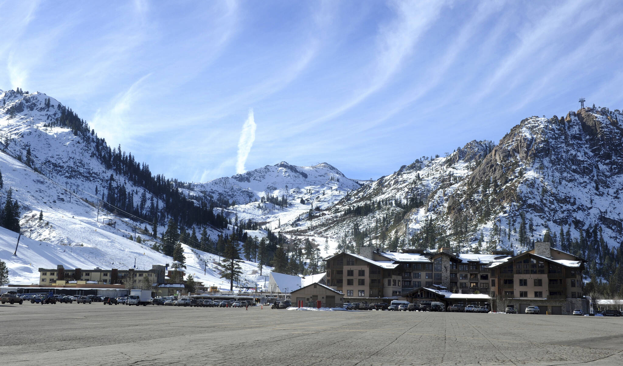 FILE - Shown is the base village at the Squaw Valley Ski Resort in Olympic Valley, Calif, on Dec. 16, 2011. U.S. Interior Secretary Deb Haaland on Friday, Nov. 19, 2021, declared "squaw" to be a derogatory term and said she is taking steps to remove the term from federal government use and to replace other derogatory place names. The popular California ski resort changed its name to Palisades Tahoe earlier this year. (Tim Dunn/The Reno Gazette-Journal via AP, File)