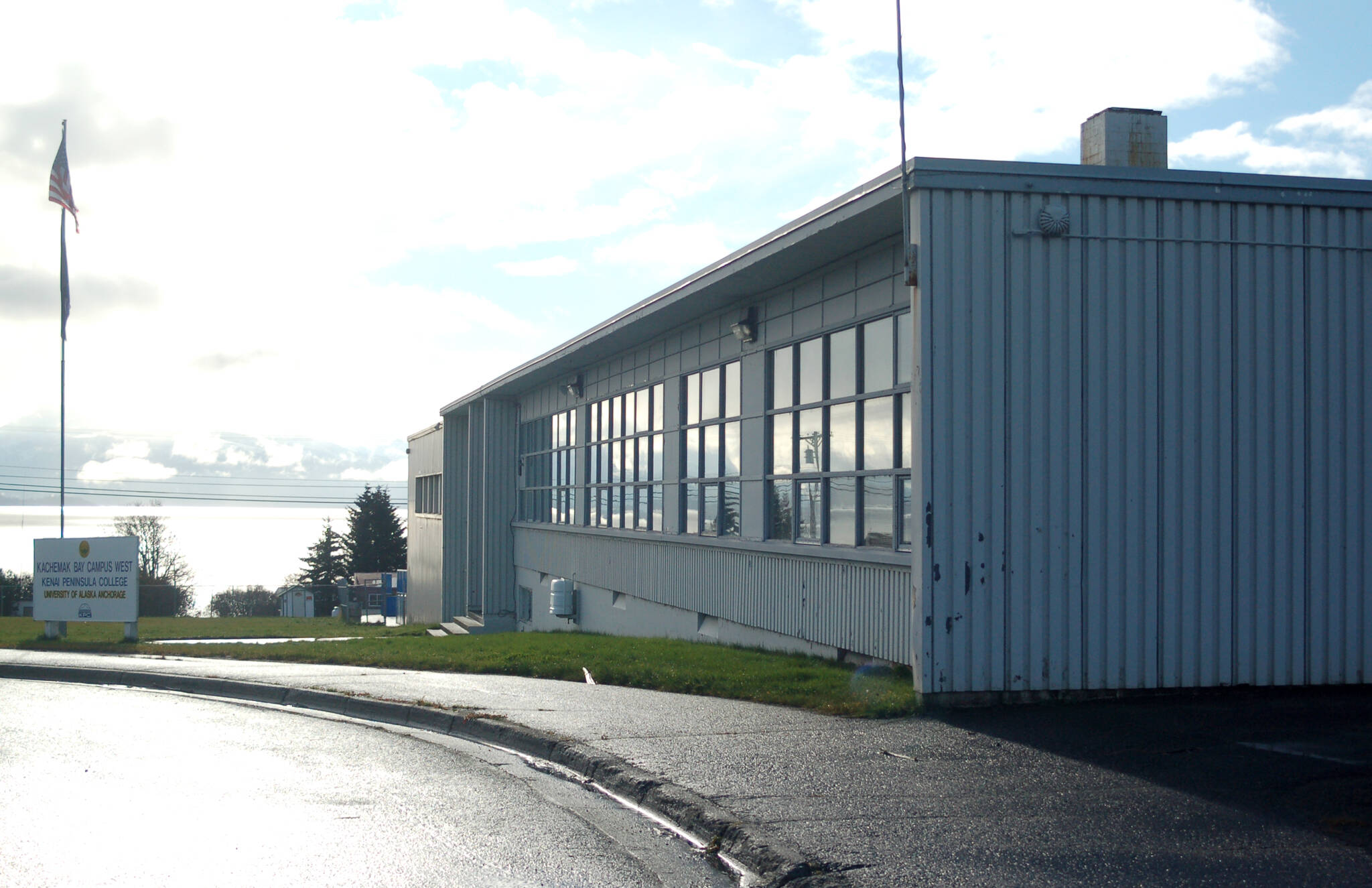 The old Homer intermediate school building, showing the Homer Boys & Girls Club and gym on the south side of the building at the corner of the Sterling Highway and Pioneer Avenue.