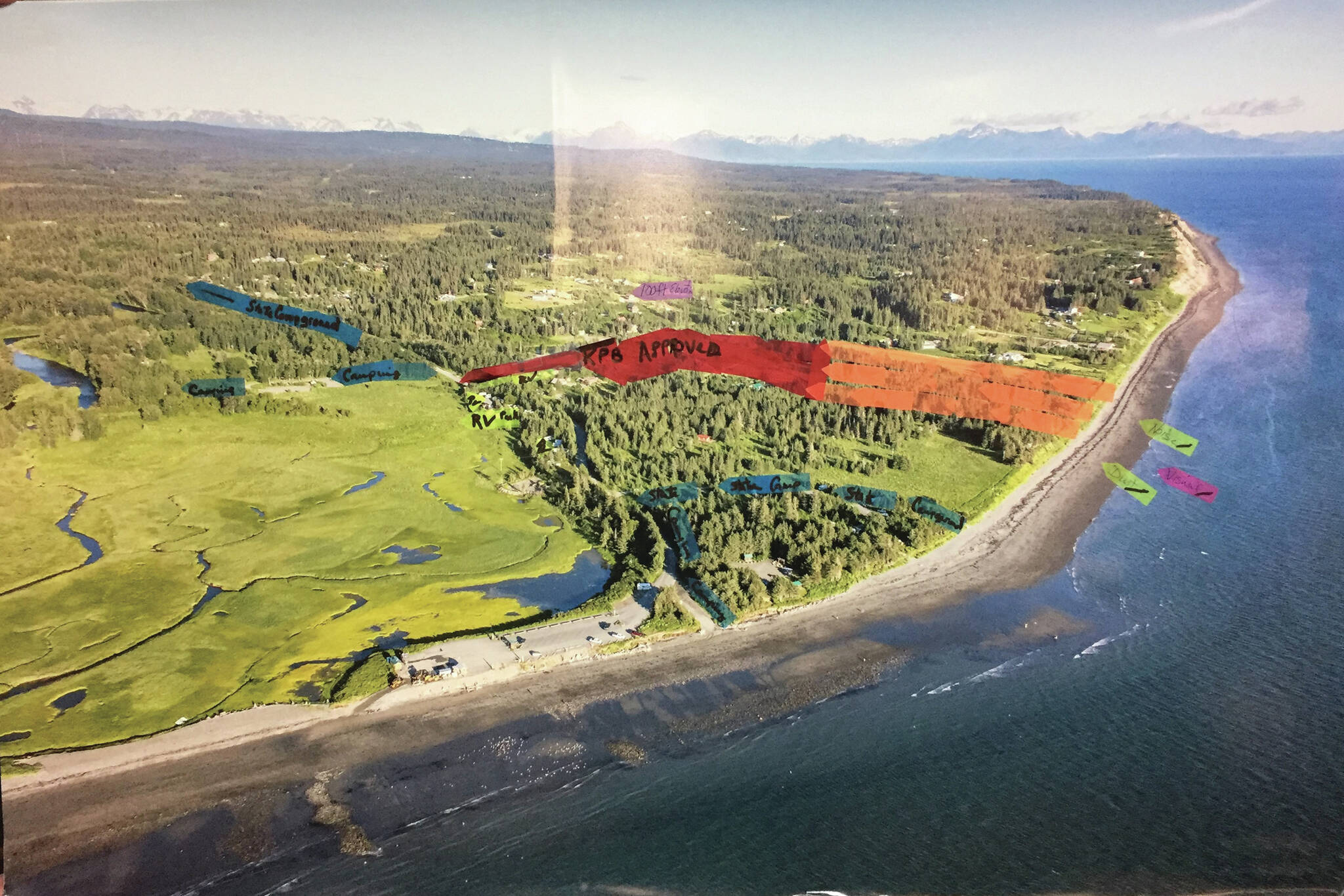 A diagram presented by Teresa Jacobson Gregory illustrates the proposed extension of the Beachcomber LLC gravel pit and the impact it may have on the surrounding state recreation area. The red markers indicate the current gravel mining area, and the orange represents the area the extension may allow for mining if approved. (Image courtesy of Teresa Jacobson Gregory)