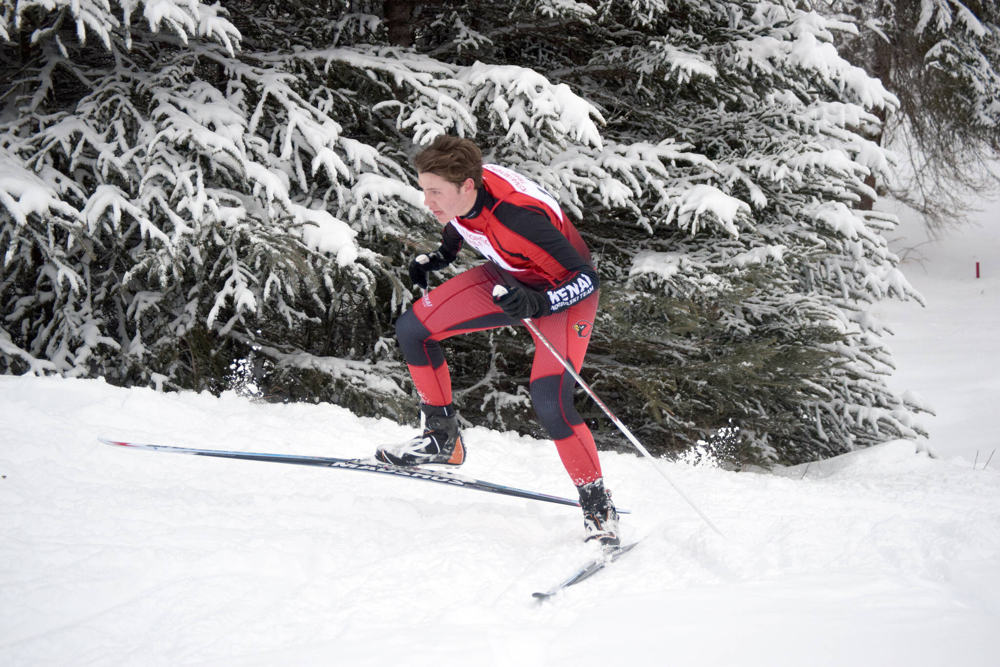 Jeff Helminiak/Peninsula Clarion 
Kenai’s George Wright skates to 18th place in the varsity race at the Kardinal Klassic at the Kenai Golf Course on Friday in Kenai.