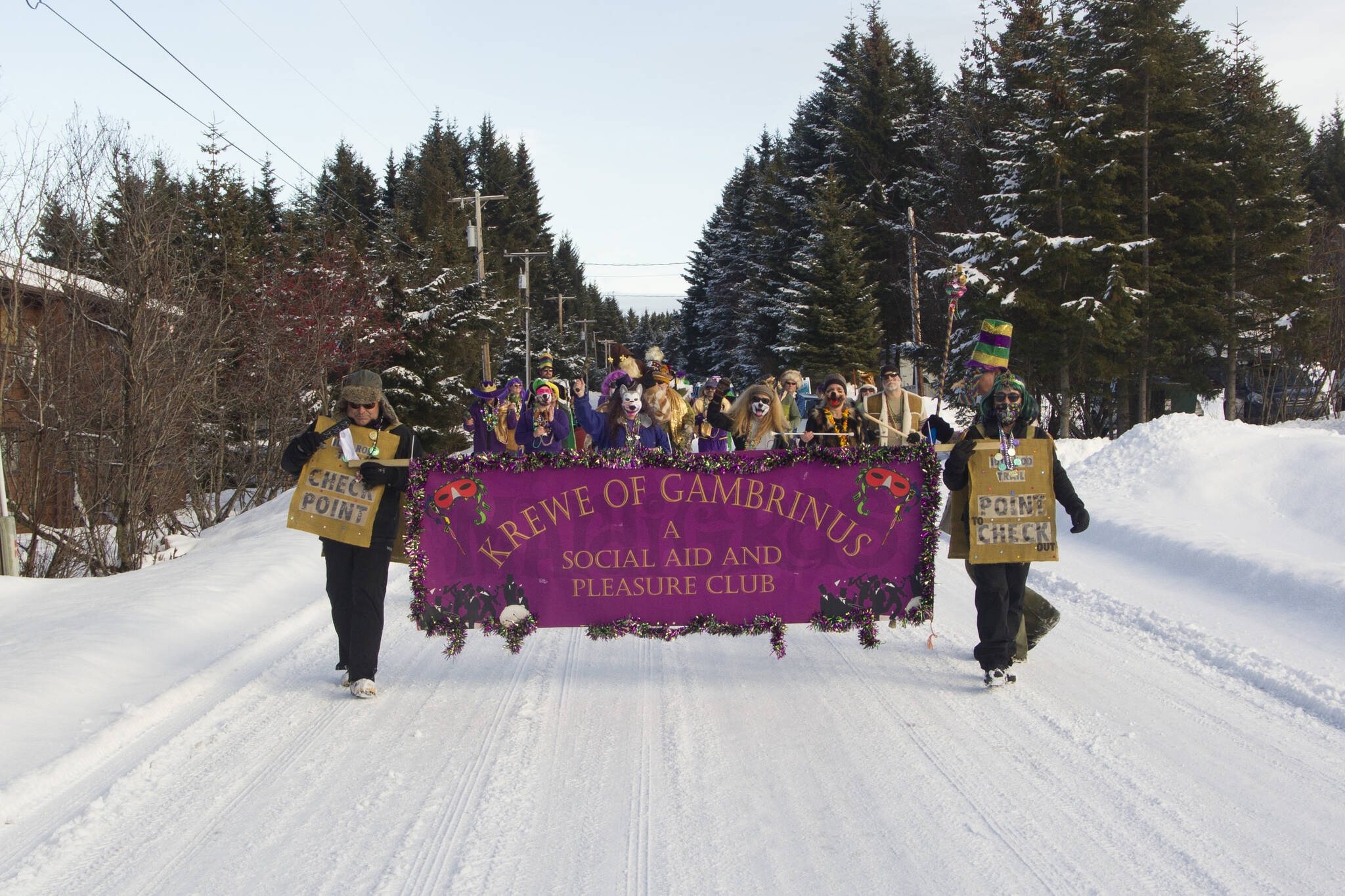 The Krewe of Gambrinus parades down Lake Shore Drive. (Photo by Sarah Knapp/Homer News)