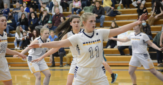 Lady Mariner Sydney Shelby and her teammates put up a defense against the Lady Bulldogs during Senior Night on Friday, Feb. 25, 2022, at the Alice Witte Gym at Homer High School in Homer, Alaska. Behind Shelby are, from left to right, Mel Morris, Hannah Stonorov, Delilah Harris, and Bethany Engebretsen. (Photo by Michael Armstrong/Homer News)