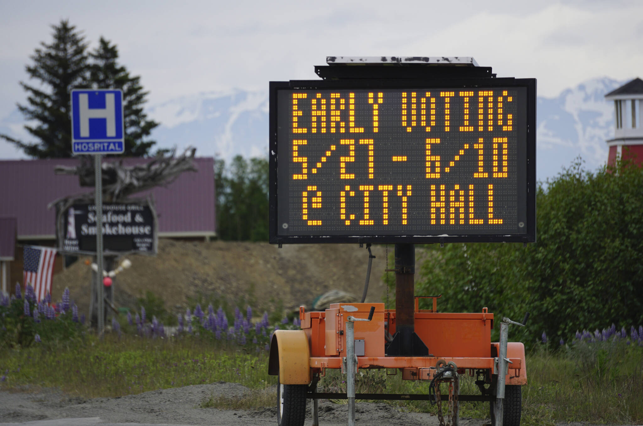 A portable sign on the Sterling Highway on Tuesday, June 7, 2022, reminds voters they can vote or turn in their special-election mail-in ballots at Homer City Hall through Friday, June 10, 2022. (Photo by Michael Armstrong/Homer News)