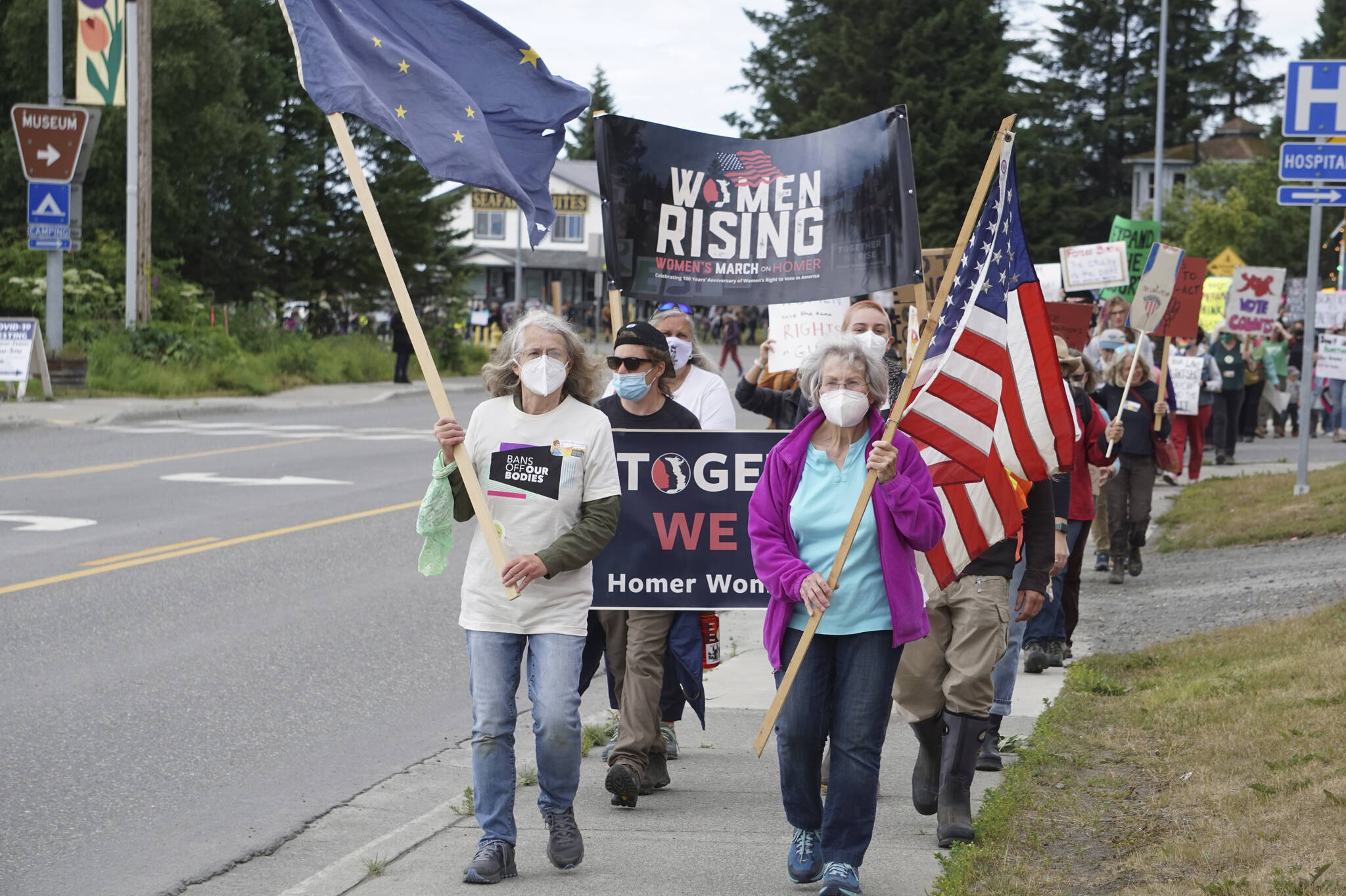 A group of about 400 people march along Pioneer Avenue for the “Women’s March: Bans Off Our Bodies” protest on Saturday, July 9, 2022, in Homer, Alaska. (Photo by Michael Armstrong/Homer News)