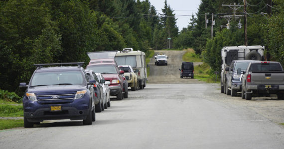 Vehicles are parked in or near the road on Thursday, Aug. 4, 2022, on Lakeshore Drive in Homer, Alaska. An ordinance passed by the Homer City Council on Monday, Aug. 8, 2022, made it unlawful to push snow into roads and city right-of-ways and to park vehices or leave other objects that interfere with snow removal or road maintenance  in city roads, paths, sidewalks or drainage ways or structures. (Photo by Michael Armstrong/Homer News)