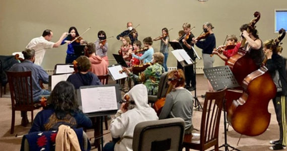 A Homer Youth Orchestra Club rehearsal is conducted by Abimael Melendez. (Photo Courtesy Kim Fine)