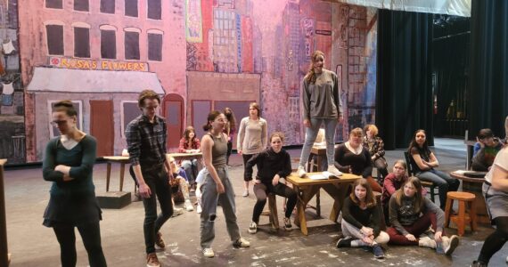 Homer choir students rehearse for Newsies on March 9 in the Homer Mariner Theater. Photo provided by Blaise Banks.