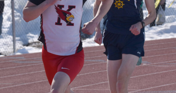 Photo by Jeff Helminiak/Peninsula Clarion
Kenai Central’s Greg Fallon leads Homer’s Seamus McDonough in the 800-meter run Saturday, April 22, 2023, at the SoHi Invitational at Justin Maile Field at Soldotna High School in Soldotna, Alaska.