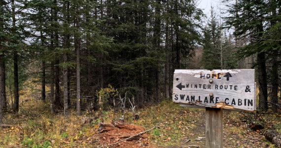 Signage points the way to the Swan Lake Cabin in the Chugach National Forest on Saturday, Oct. 1, 2022 near Cooper Landing, Alaska. (Ashlyn O’Hara/Peninsula Clarion)