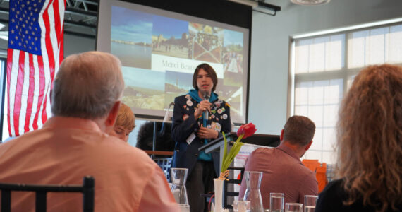 Thomas Smith, a high school student from Kenai who recently completed a year-long exchange program in France, speaks to the Soldotna Rotary Club about his experience at Addie Camp in Soldotna, Alaska, on Thursday, Aug. 3, 2023. (Jake Dye/Peninsula Clarion)