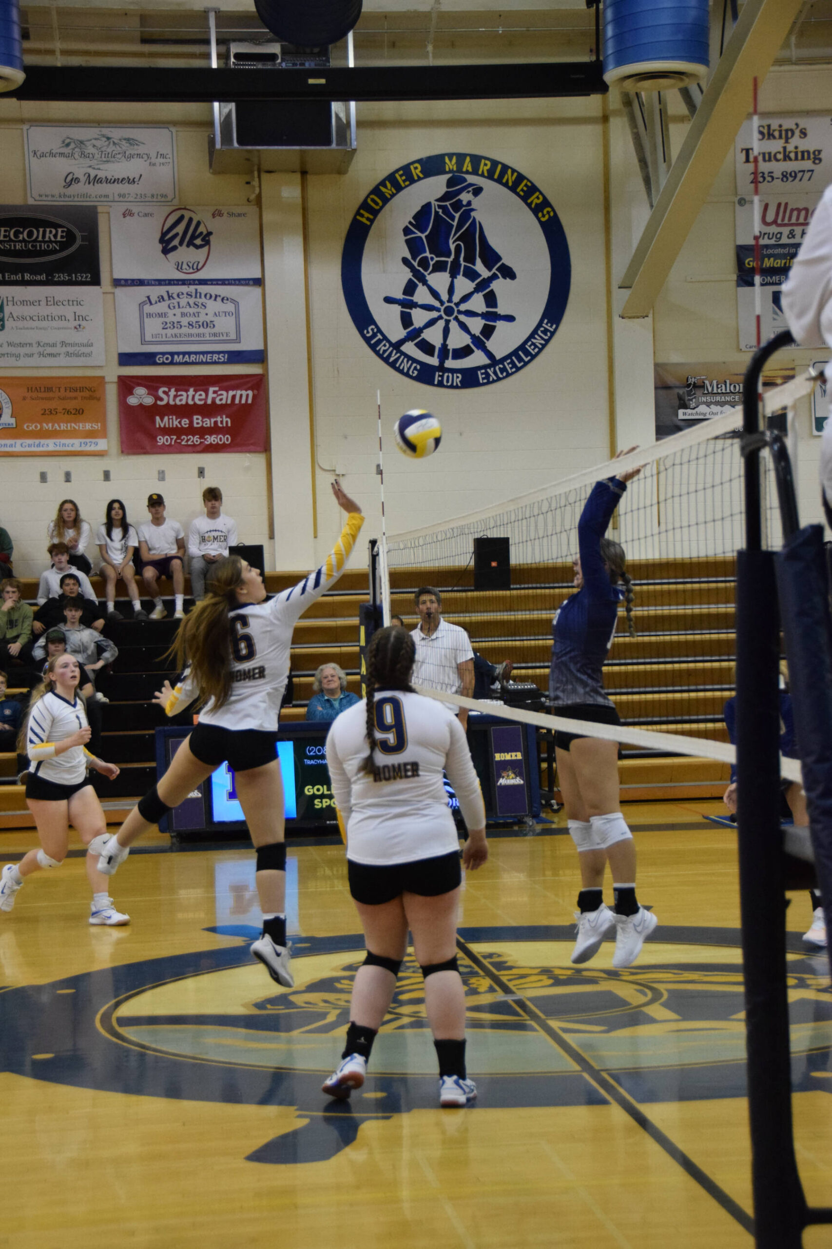 Homer middle blocker Alexandra Casey jumps for the ball at the varsity game versus Soldotna on Friday, Sept. 1, 2023 in Homer, Alaska. (Delcenia Cosman/Homer News)