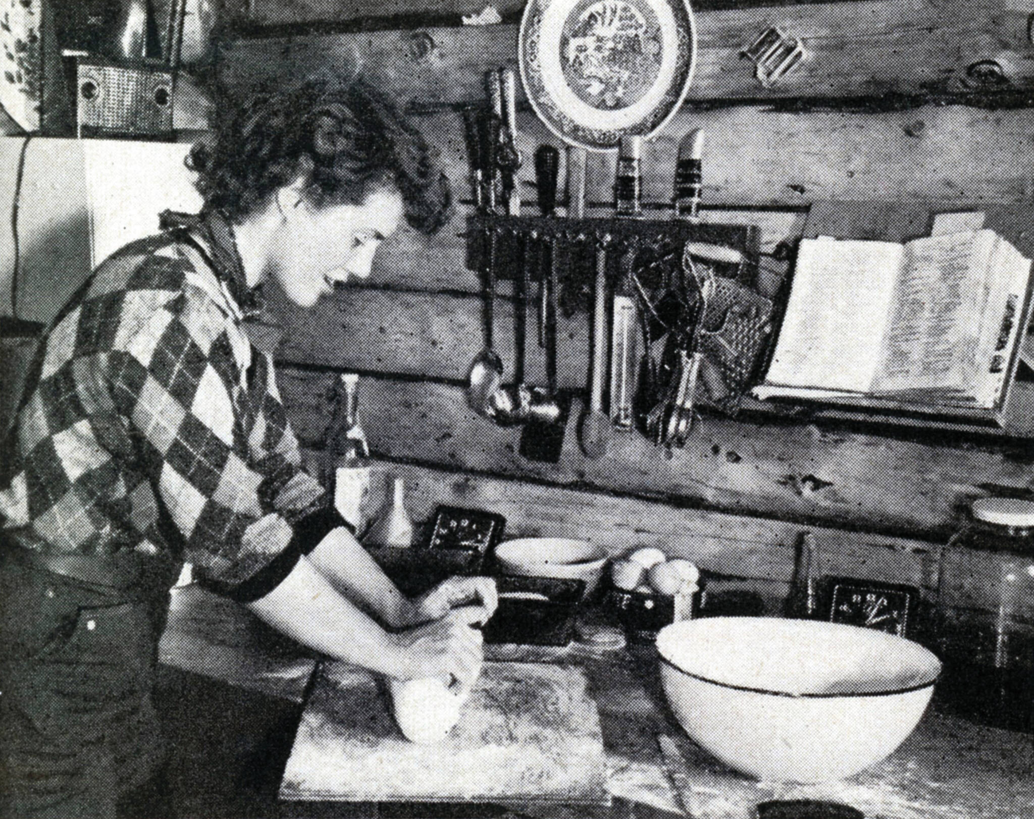 —Rusty Lancashire kneads bread dough in her kitchen. (1954 photo by Bob and Ira Spring for Better Homes & Garden magazine)