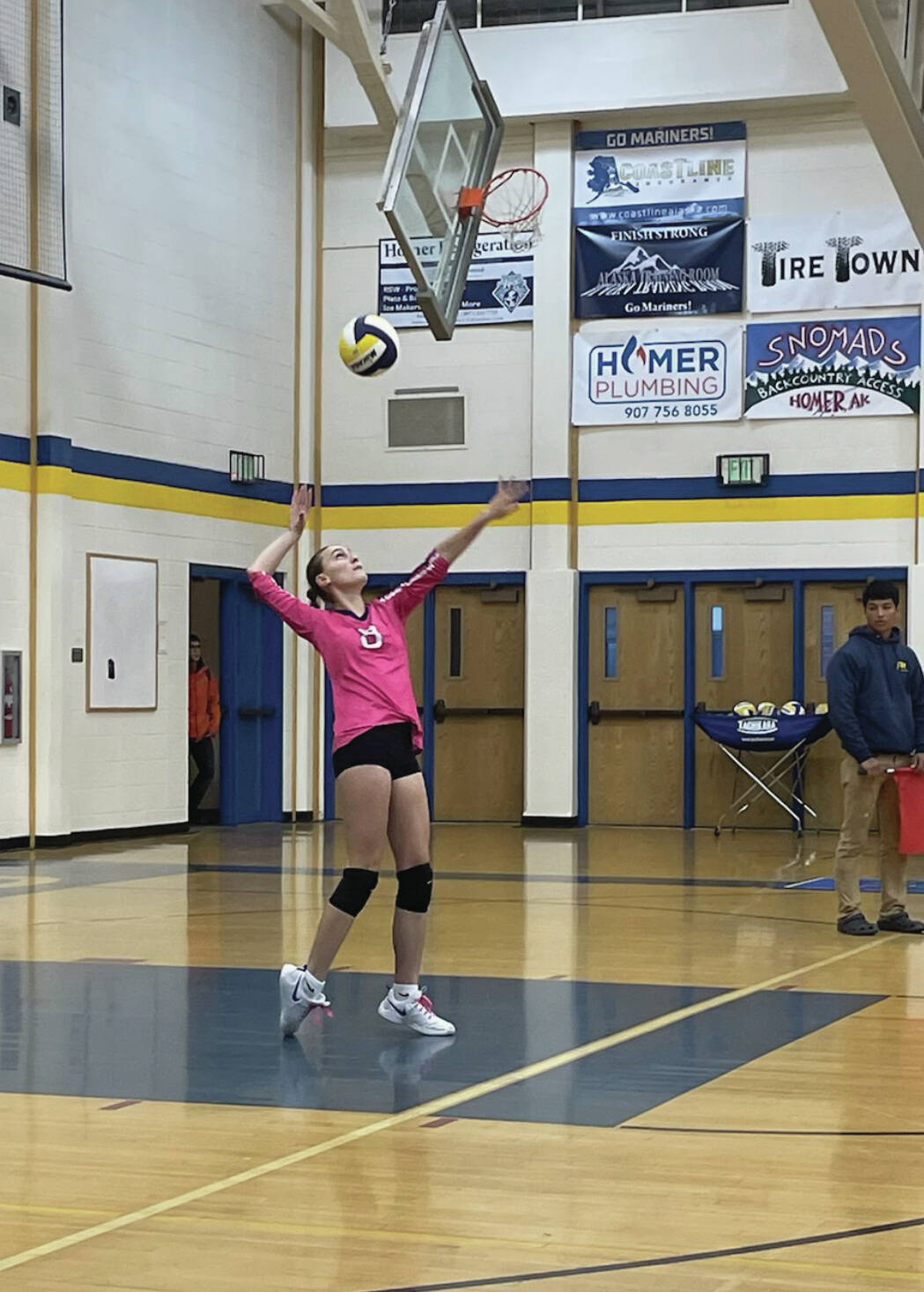 Homer senior Goldie Hill serves the ball in a game against Grace Christian on Saturday.  Emilie Springer/ Homer News