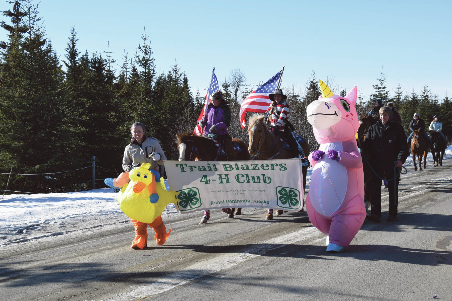 Delcenia Cosman/Homer News
Members of the Kenai Peninsula Trail Blazers 4-H Club walk in costume or ride their horses down Milo Fritz Avenue in the annual Snow Rondi parade on Saturday<ins>, March 2 in Anchor Point, Alaska</ins>.