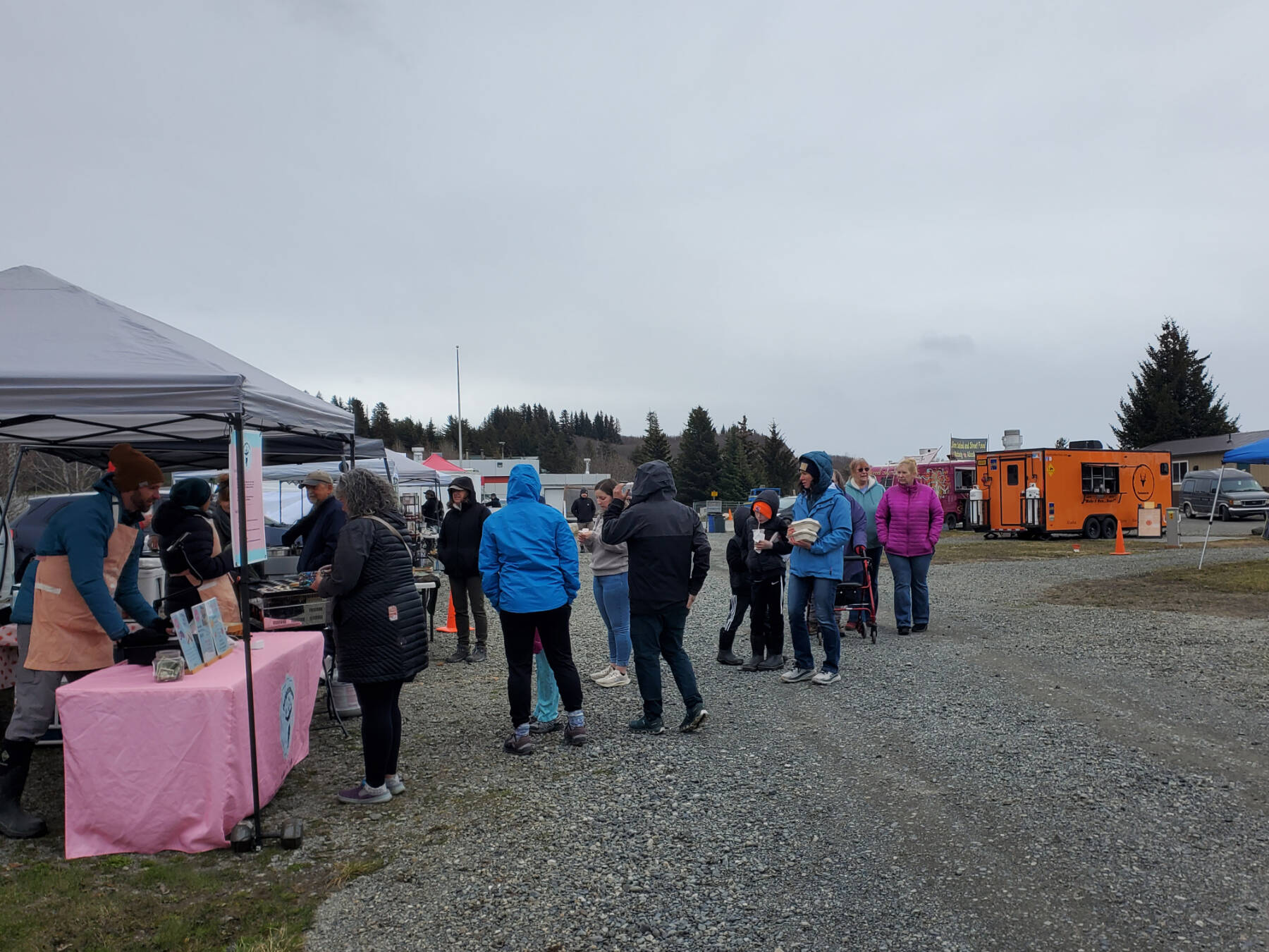 Homer community members line up for delicious offerings from multiple food trucks and booths at the Taste of Homer Food Truck Festival on Saturday, May 10, 2024 at the Baycrest KOA Campground in Homer, Alaska. (Photo by Delcenia Cosman/Homer News)