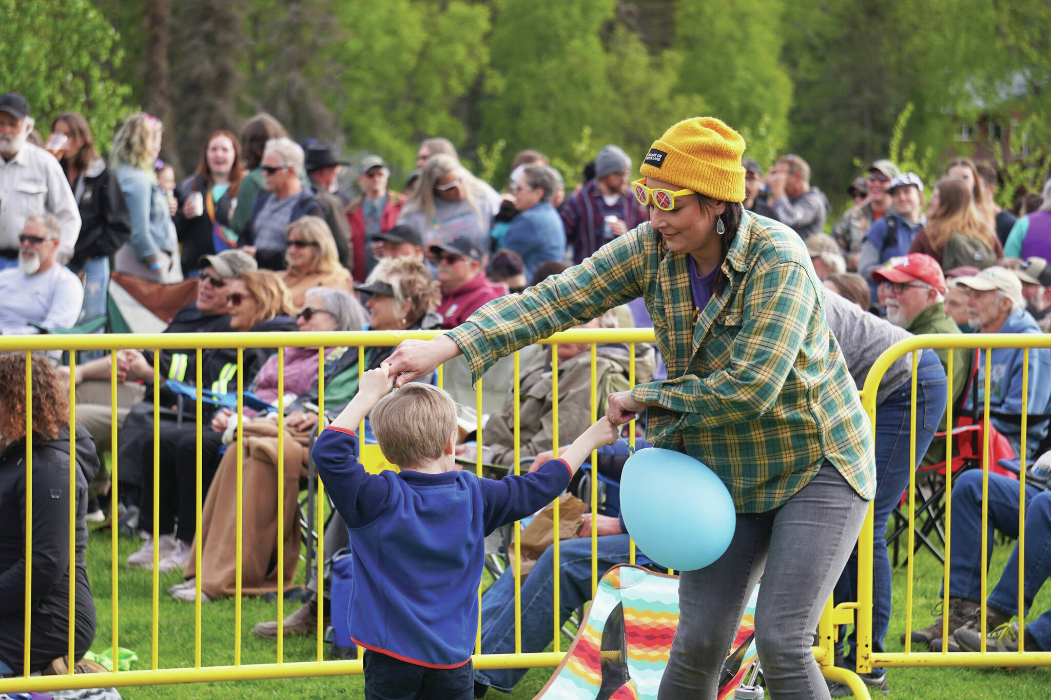 Jake Dye/Peninsula Clarion
Attendees gather to dance and to listen during a performance by Blackwater Railroad Company, part of the Levitt AMP Soldotna Music Series on Wednesday, June 7, 2023, at Soldotna Creek Park in Soldotna, Alaska.